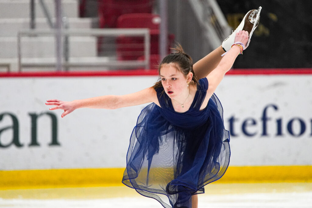 An athlete skating on the rink