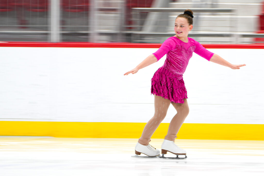 An athlete skating on the rink