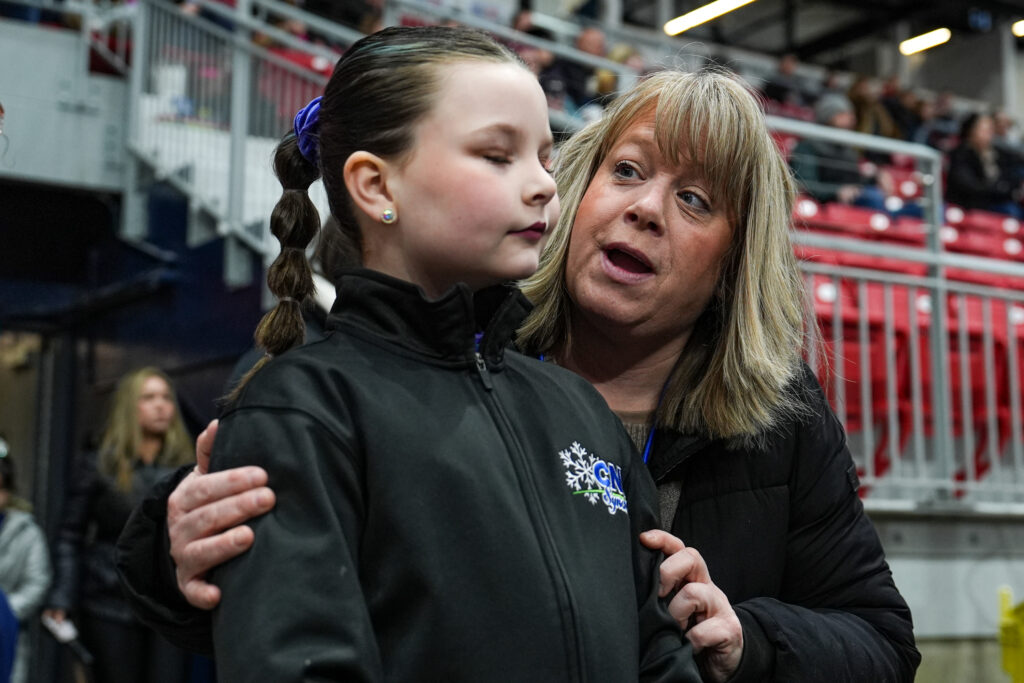 A group of athletes competing in athletic event sports
