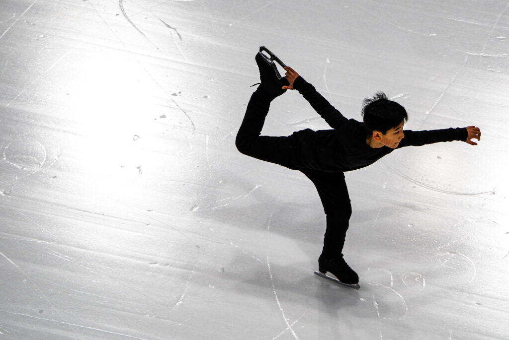 An athlete skating on the rink