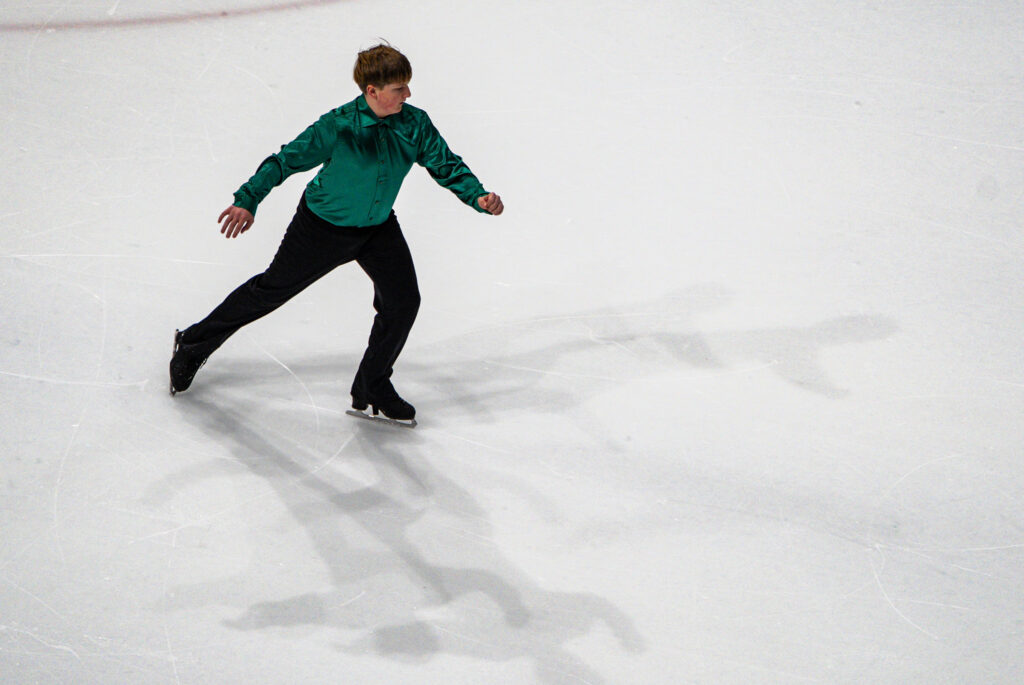 An athlete skating on the rink