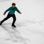 An athlete skating on the rink