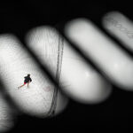 An athlete competing in athletic event sports with helmet