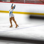 An athlete skating on the rink
