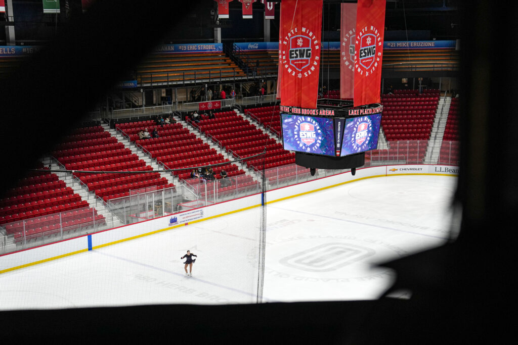 A group of athletes competing in athletic event sports