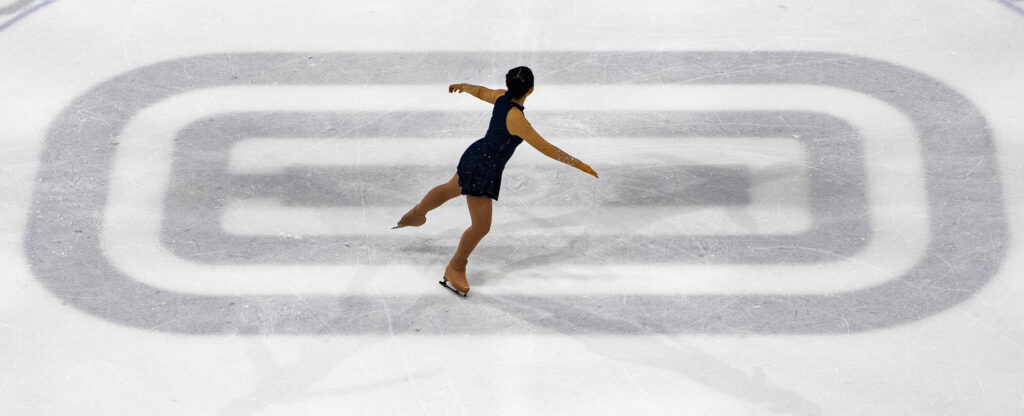 An athlete skating on the rink