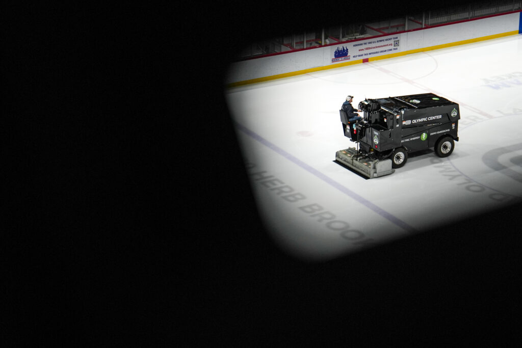 An athlete competing in athletic event sports