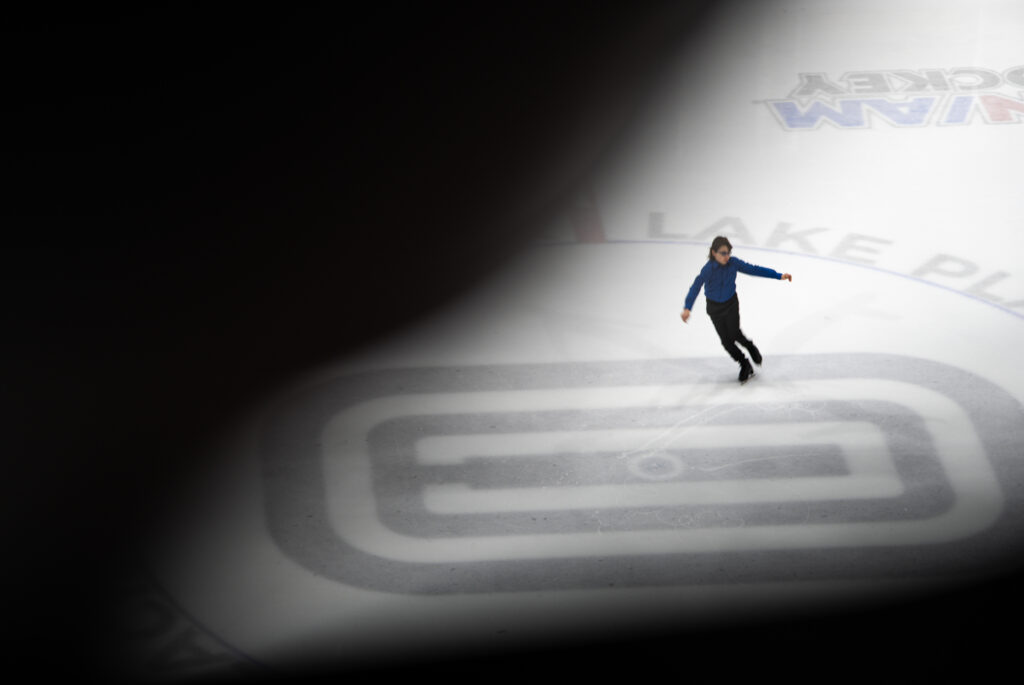 An athlete competing in athletic event sports