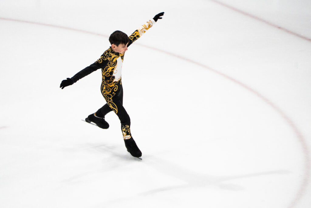 An athlete skating on the rink