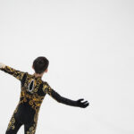 An athlete competing in athletic event sports