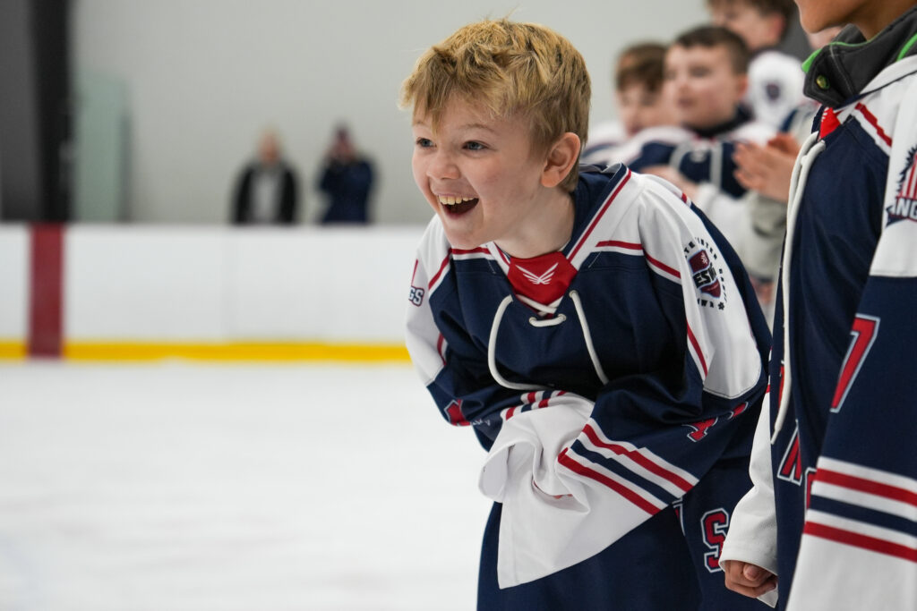 A group of athletes competing in athletic event sports