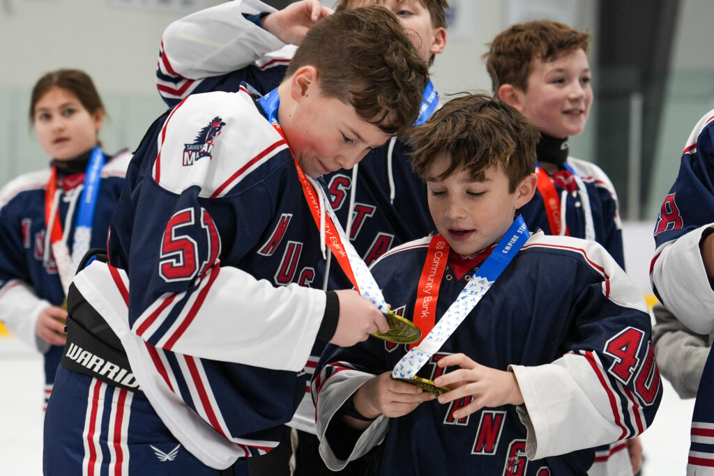 A group of athletes competing in athletic event sports