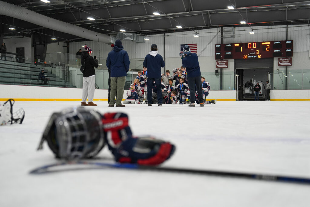 A group of athletes competing in athletic event sports