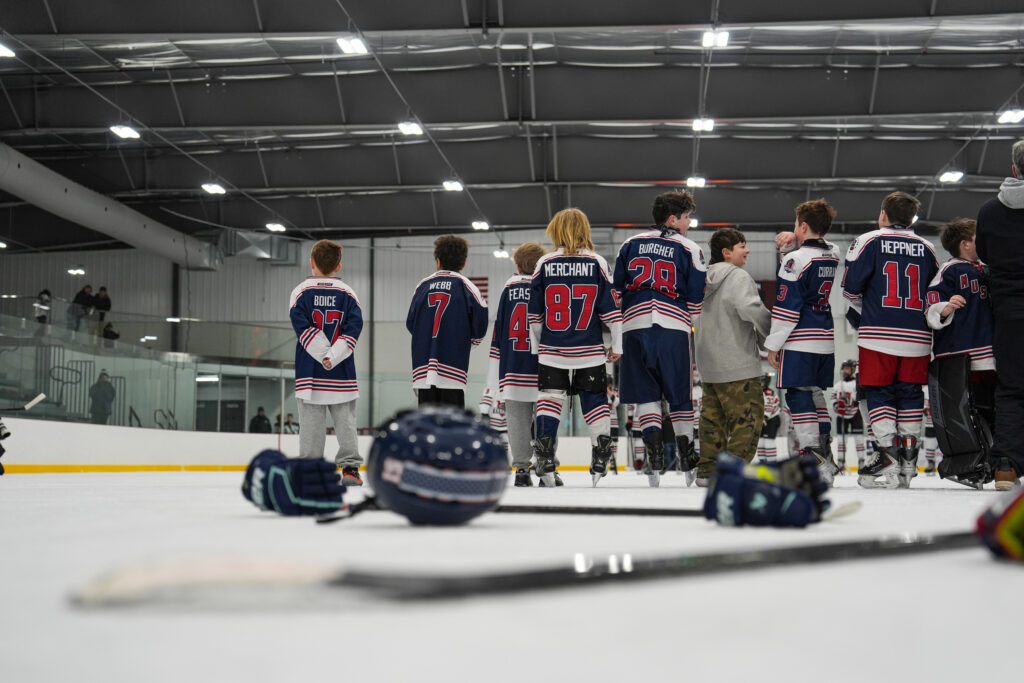 A group of athletes competing in athletic event sports with helmet