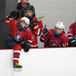 A group of athletes competing in athletic event sports with helmet
