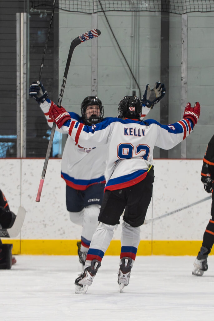 A group of athletes skating with helmet on the rink