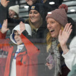 A group of athletes competing in athletic event sports