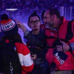 An athlete competing in athletic event sports