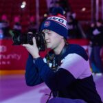 An athlete competing in athletic event sports