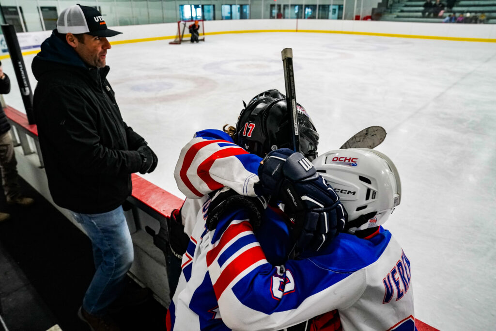 A group of athletes competing in athletic event sports with helmet