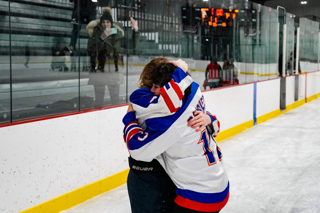 A group of athletes competing in athletic event sports