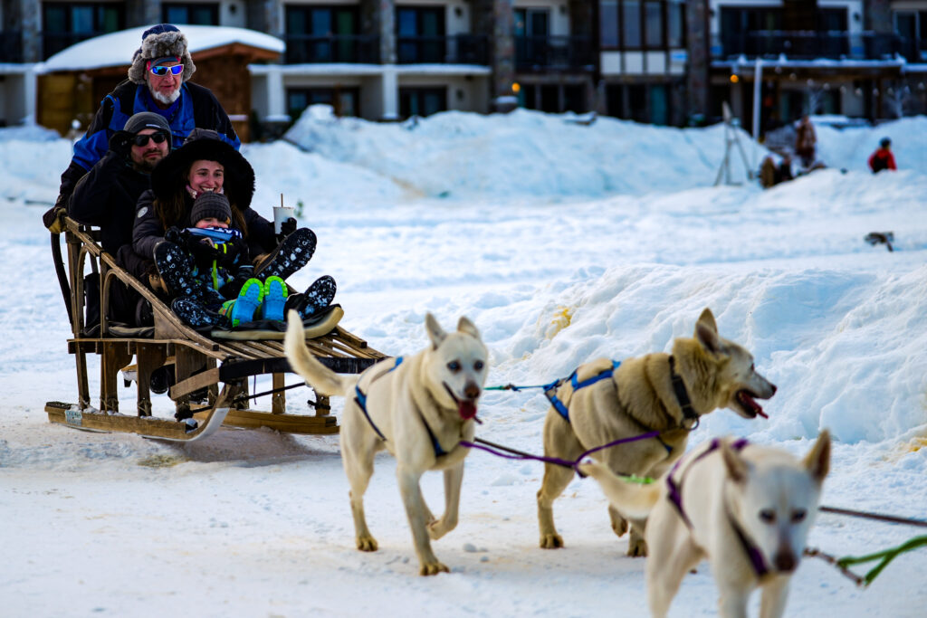 A group of athletes competing in athletic event sports in the snow