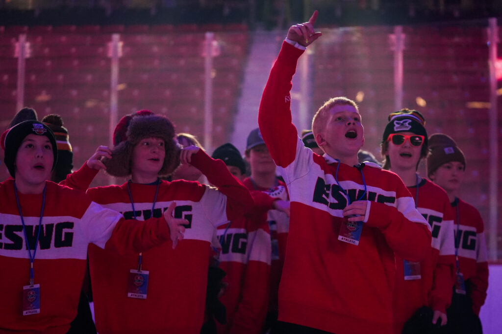 A group of athletes competing in athletic event sports