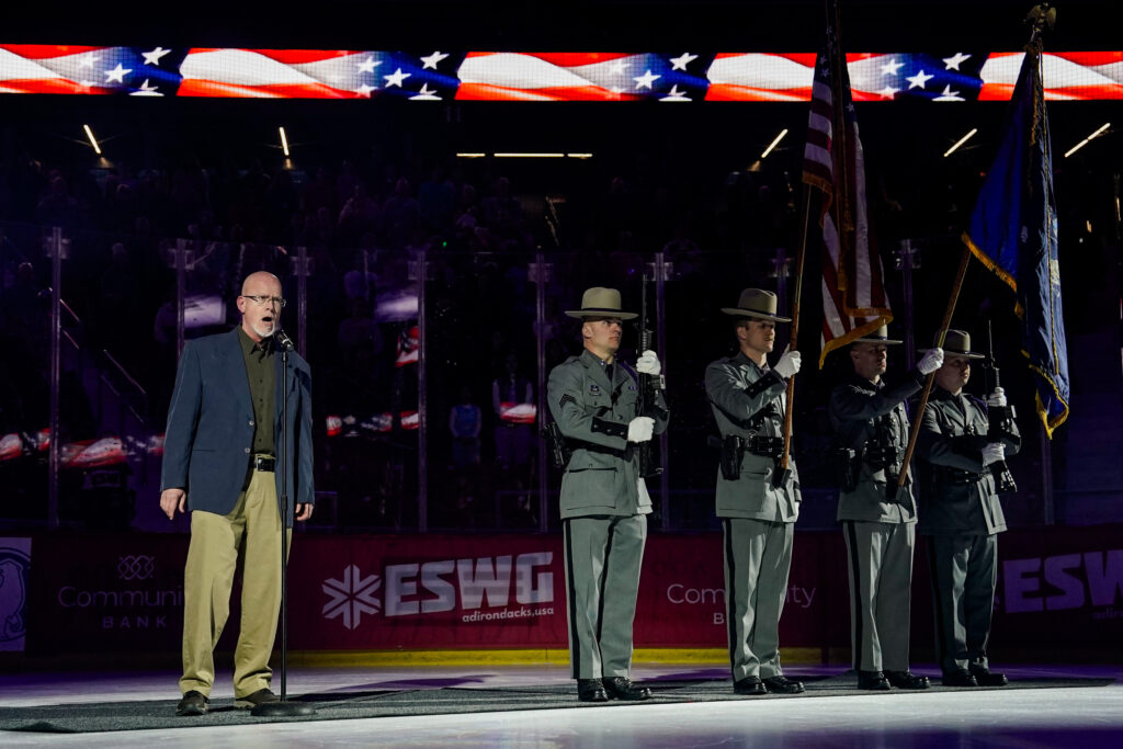 A group of athletes competing in athletic event sports