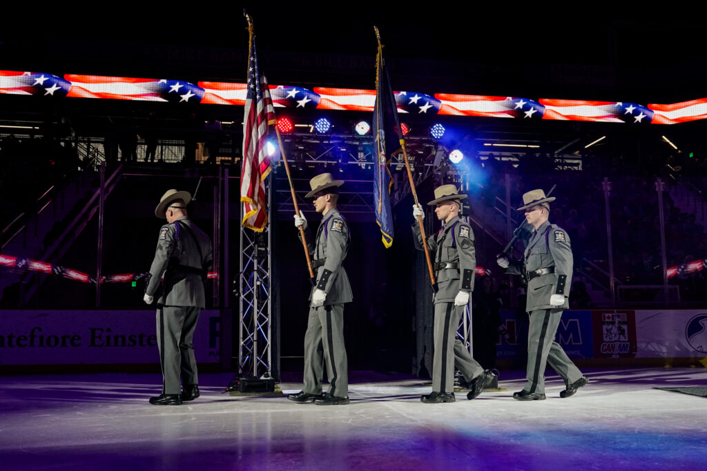 A group of athletes competing in athletic event sports