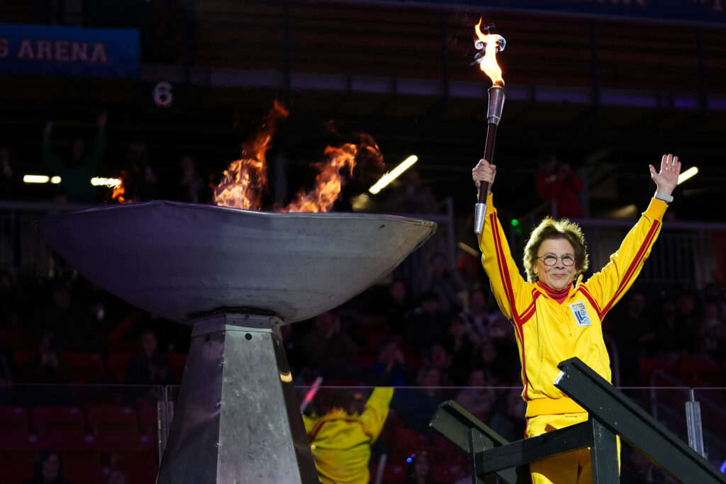 A group of athletes competing in athletic event sports
