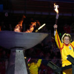 A group of athletes competing in athletic event sports