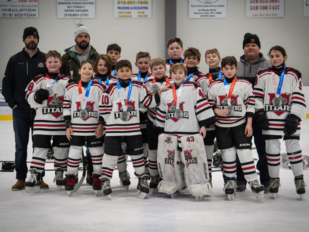 A group of athletes competing in athletic event sports