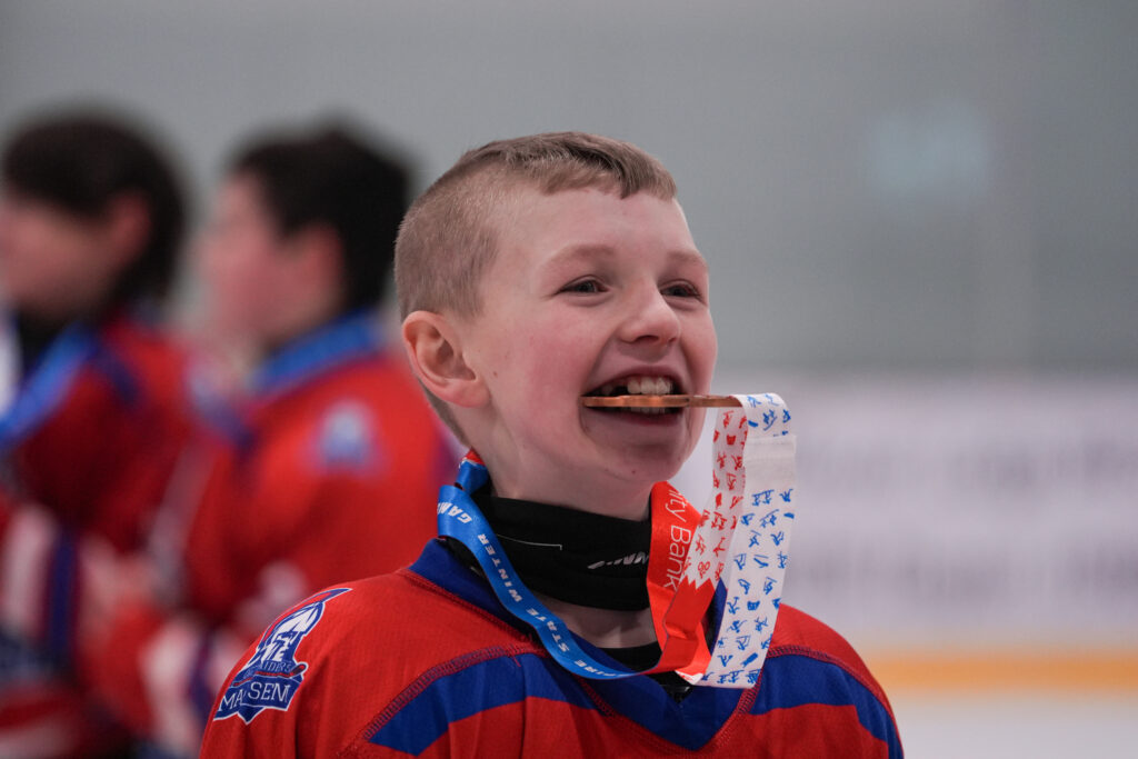 A group of athletes competing in athletic event sports