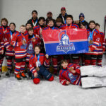 A group of athletes playing baseball on the field