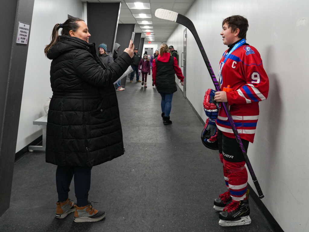 A group of athletes skating on the rink