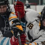 An athlete competing in athletic event sports with helmet