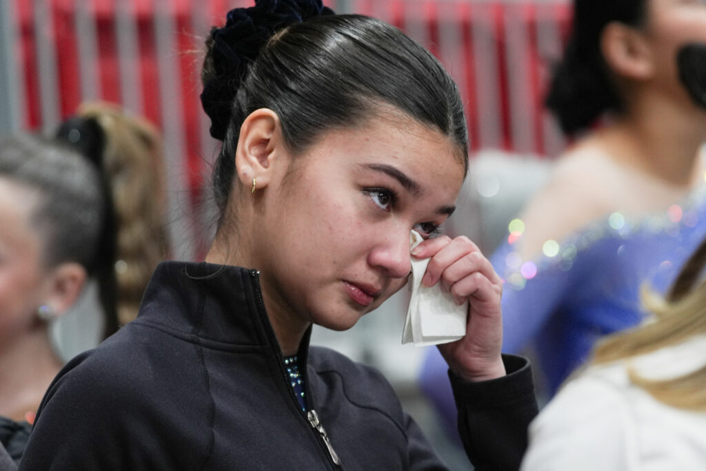 A group of athletes competing in athletic event sports