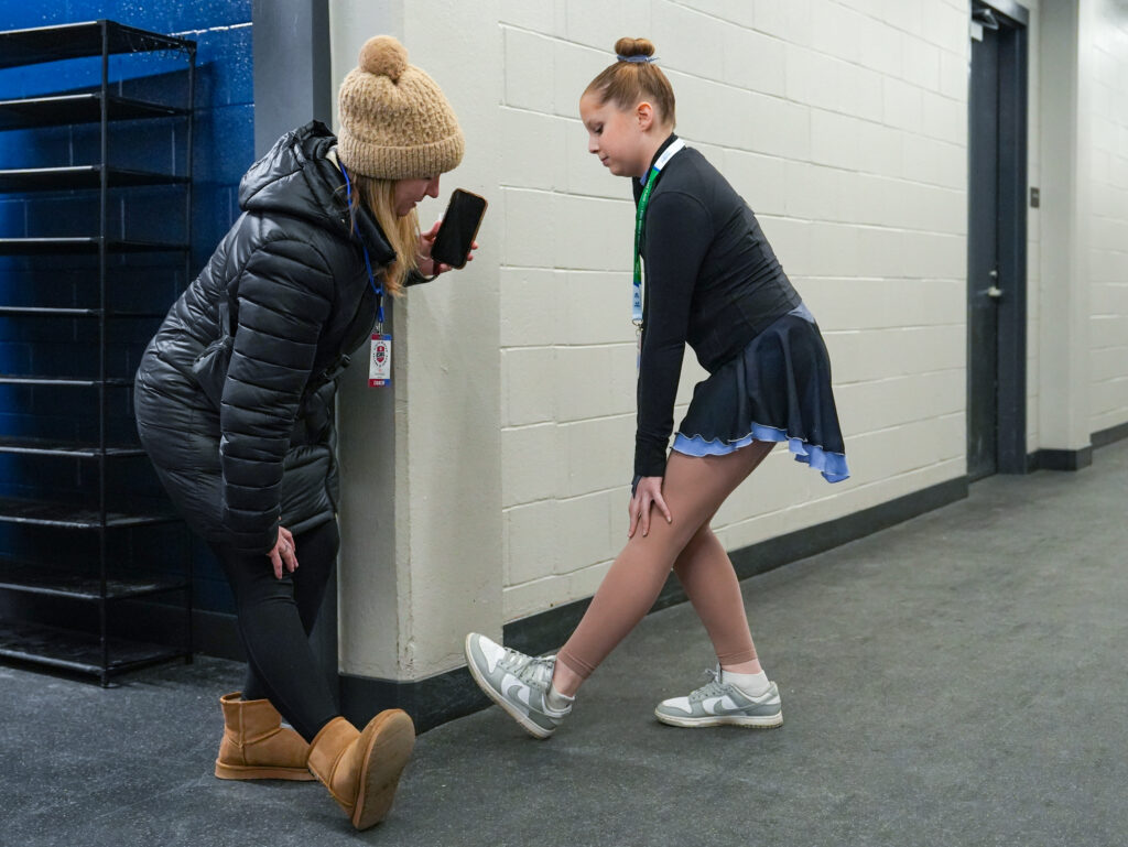 Two athletes competing in athletic event sports