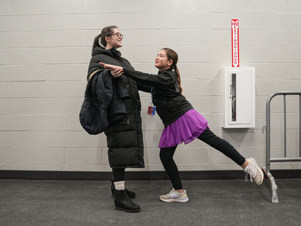 Two athletes competing in athletic event sports