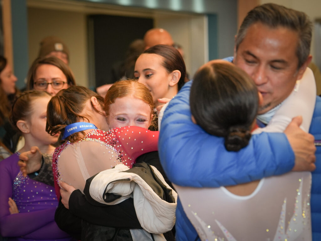 A group of athletes competing in athletic event sports
