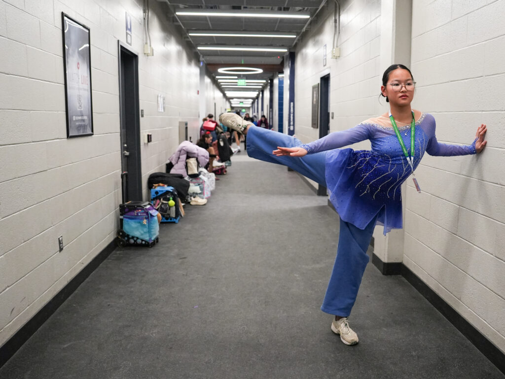 A group of athletes competing in athletic event sports