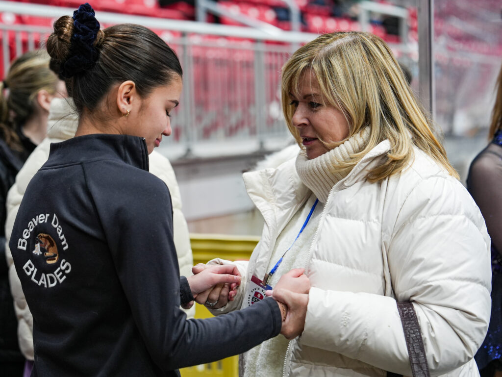 A group of athletes competing in athletic event sports