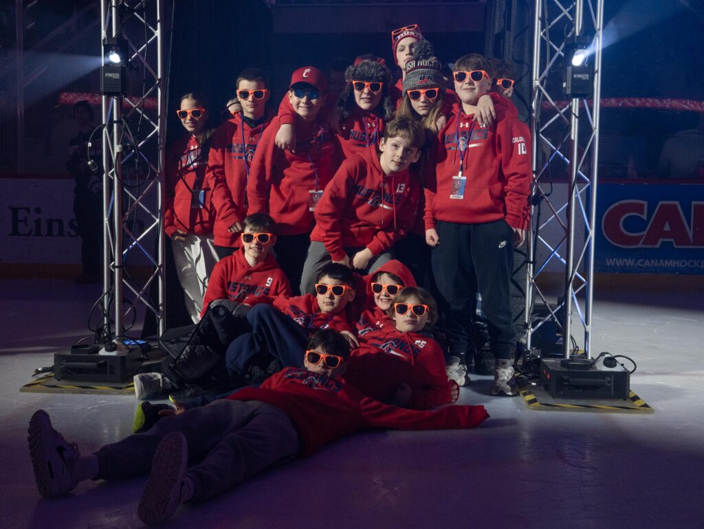 A group of athletes competing in athletic event sports