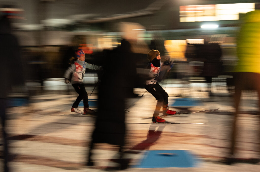 A group of athletes competing in athletic event sports