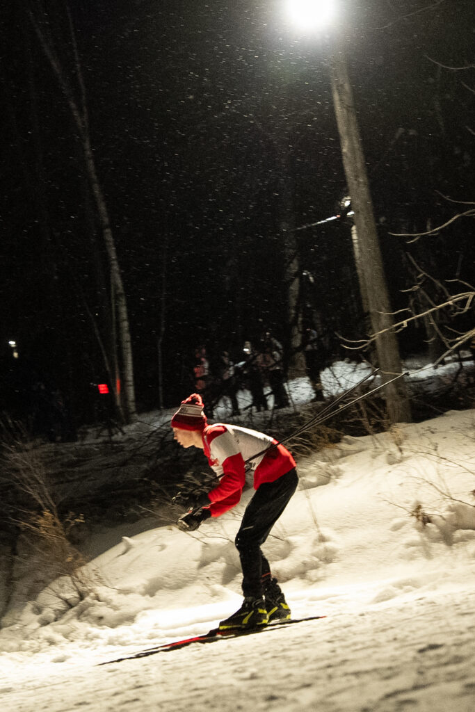 A group of athletes competing in athletic event sports in the snow
