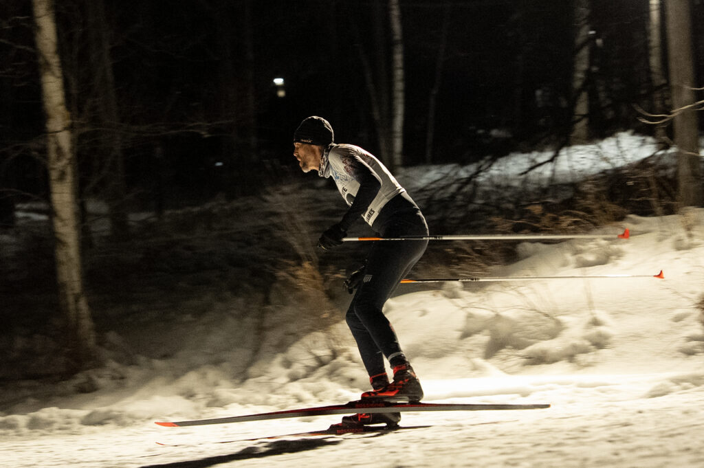 An athlete skiing in the snow