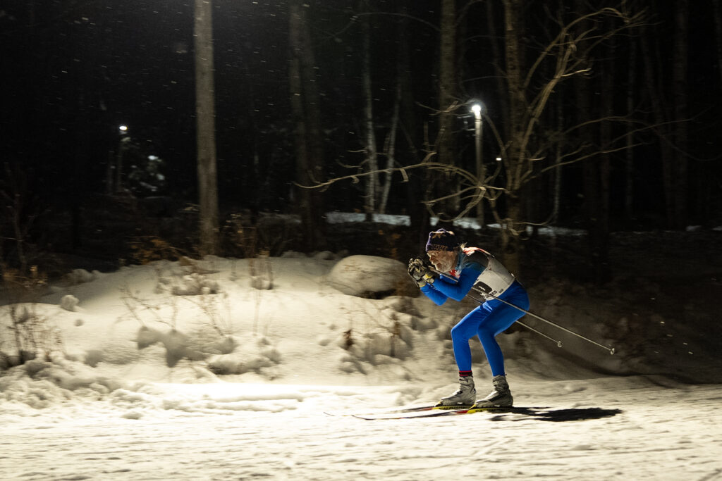 An athlete skiing in the snow
