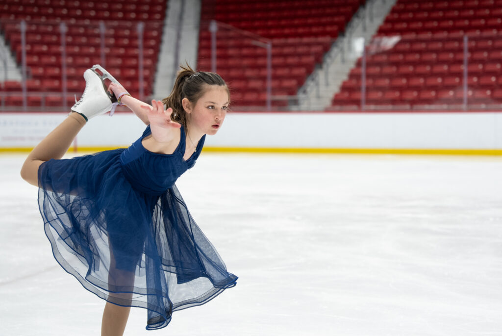 An athlete skating on the rink
