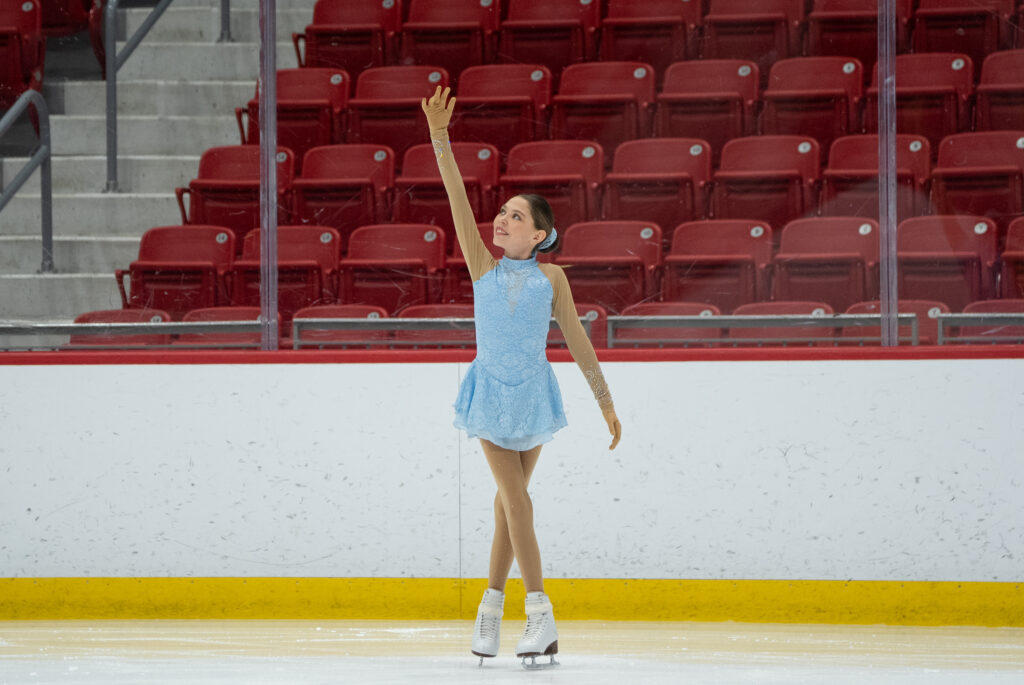 An athlete skating on the rink