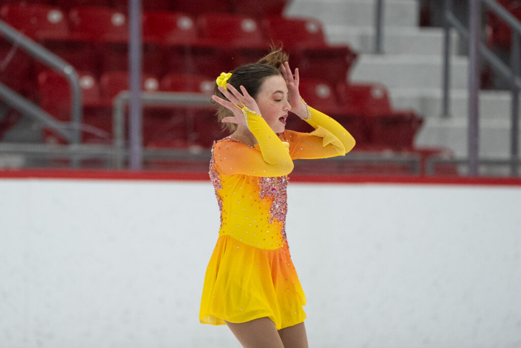 An athlete competing in athletic event sports